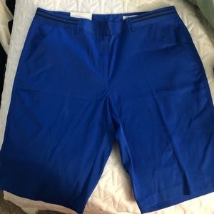 Greg Norman blue golf shorts